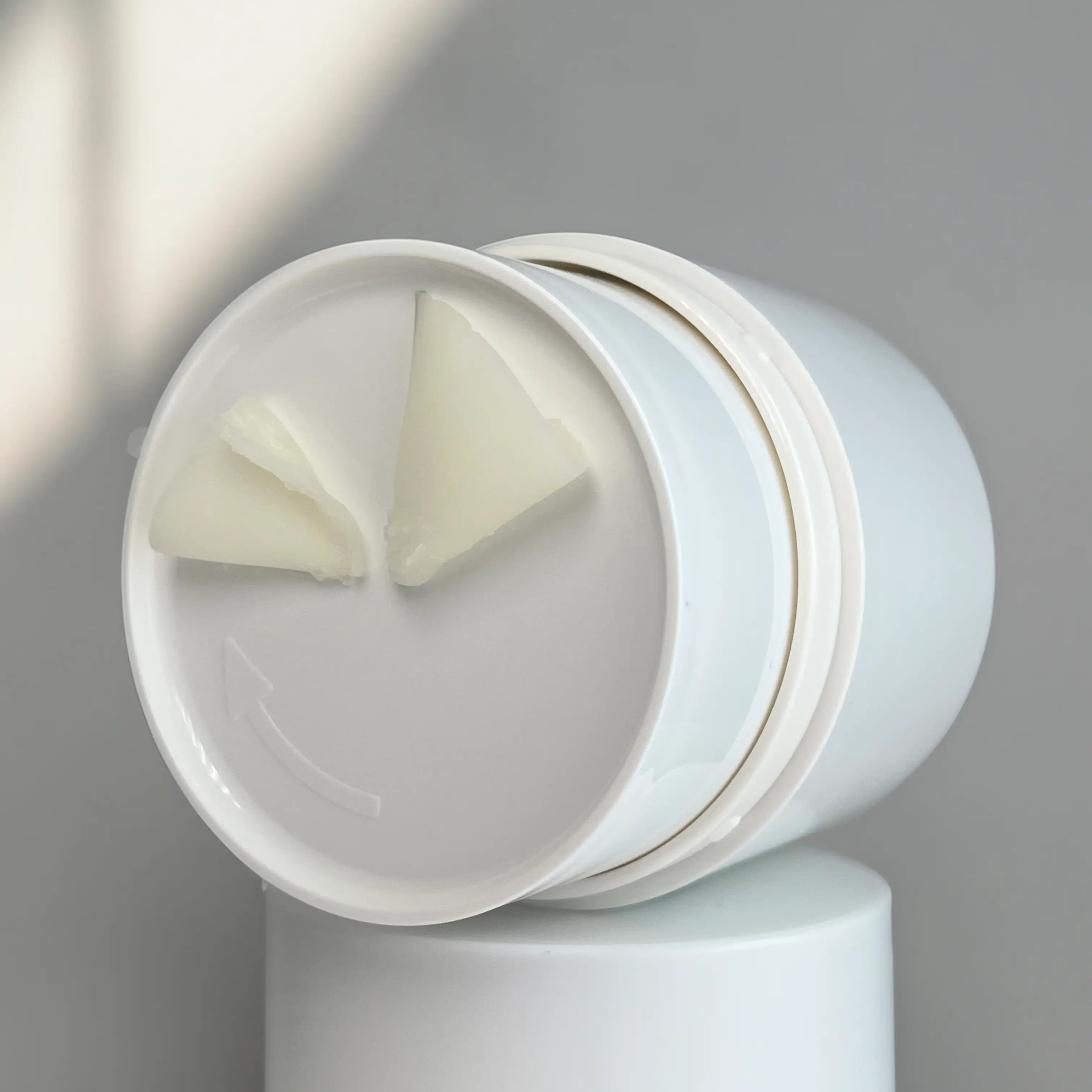 Natural cleansing balm with grinder packaging, made with natural oils for effective makeup removal and nourishment in Dubai.