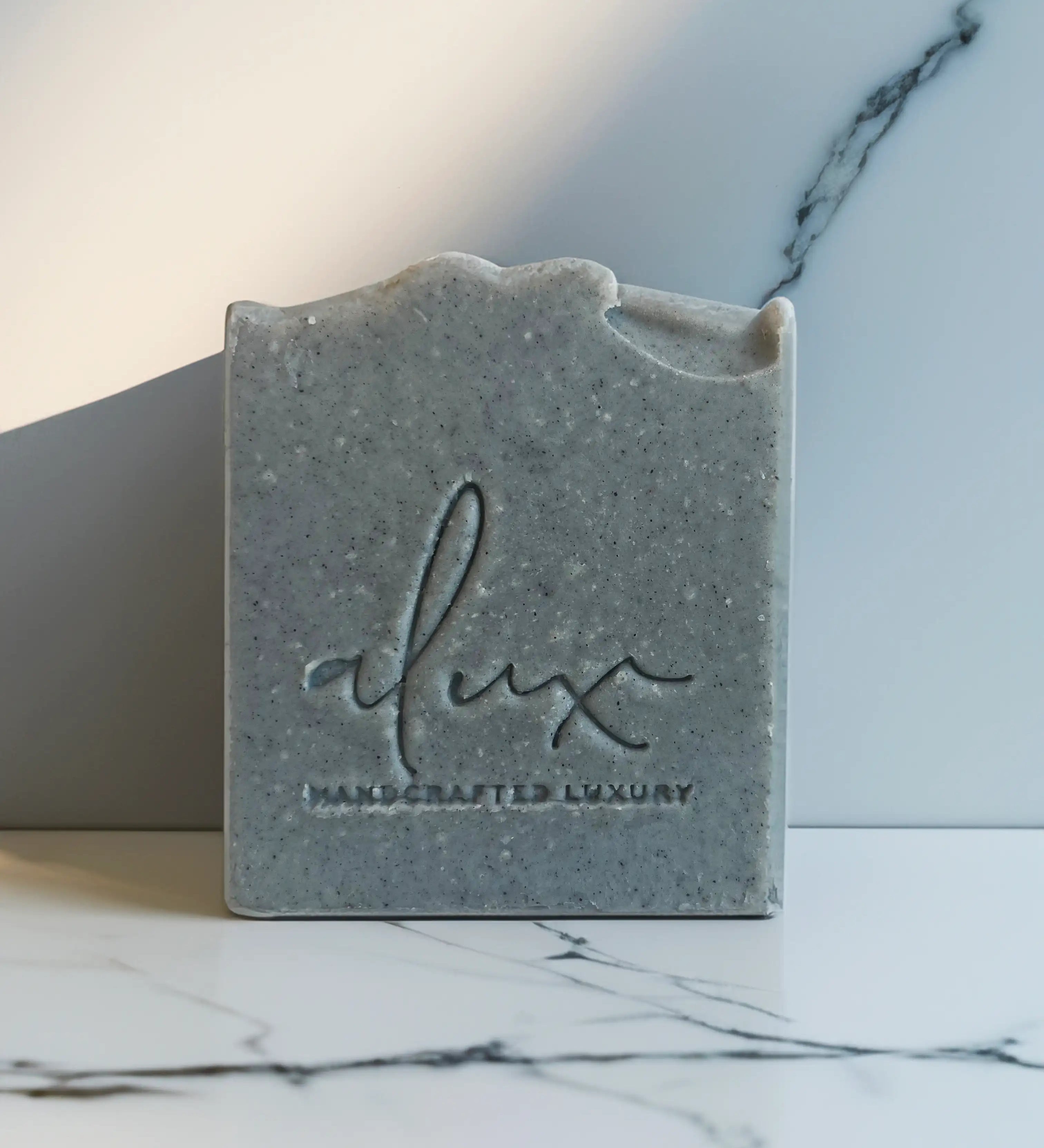 Handcrafted activated charcoal soap with eucalyptus and tea tree essential oils