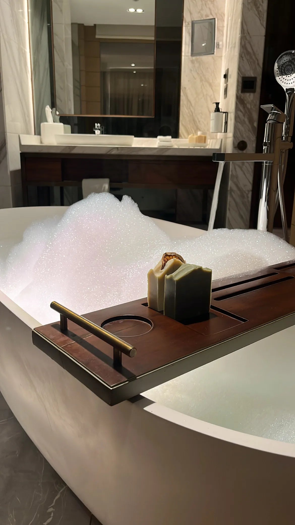 Handmade natural soaps by Alux Cosmetics displayed in a bathroom – Artisan skincare crafted in Dubai for a luxurious cleansing experience