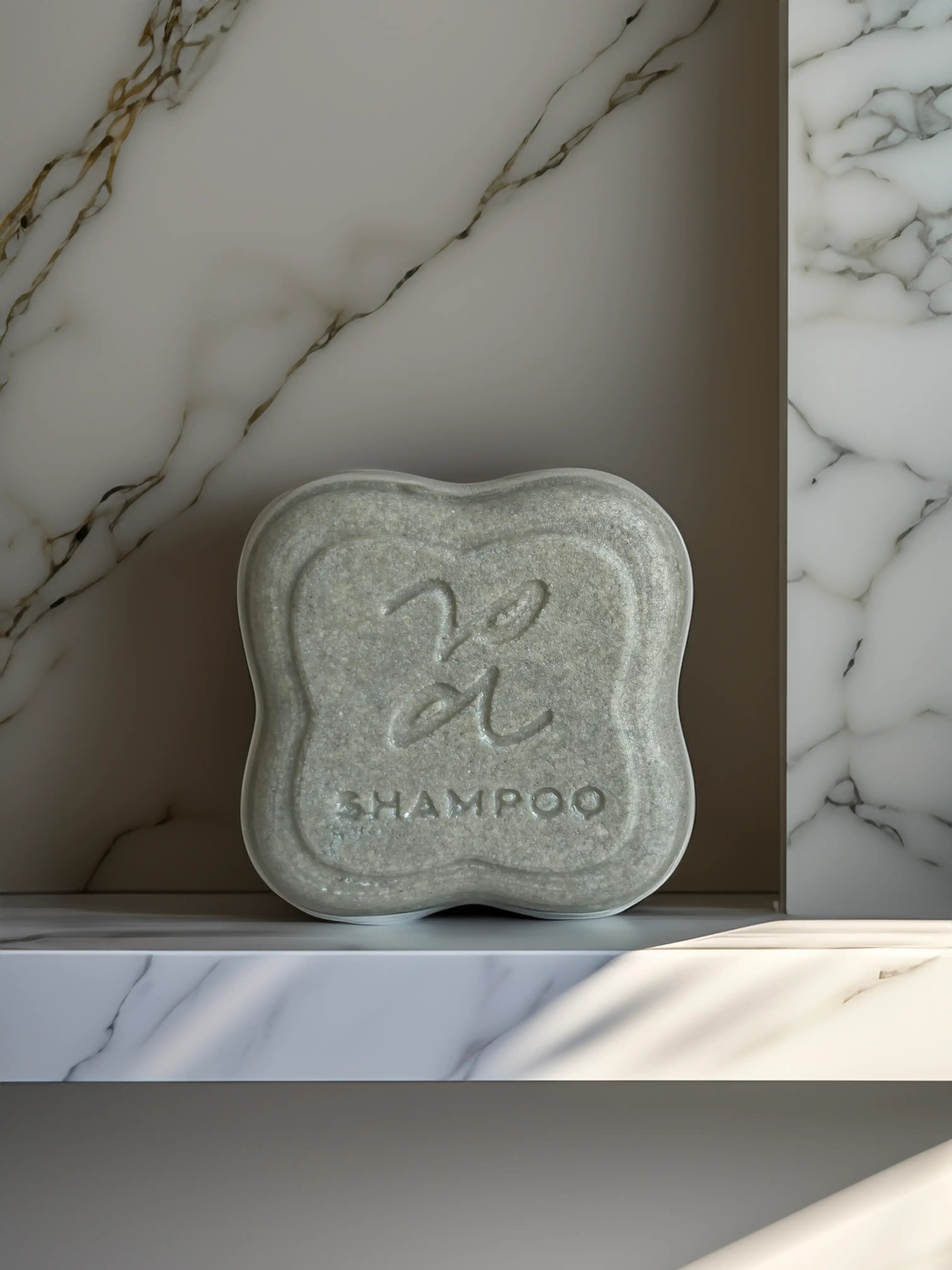 Close-up of Alux Cosmetics nourishing natural shampoo bar for healthy hair.