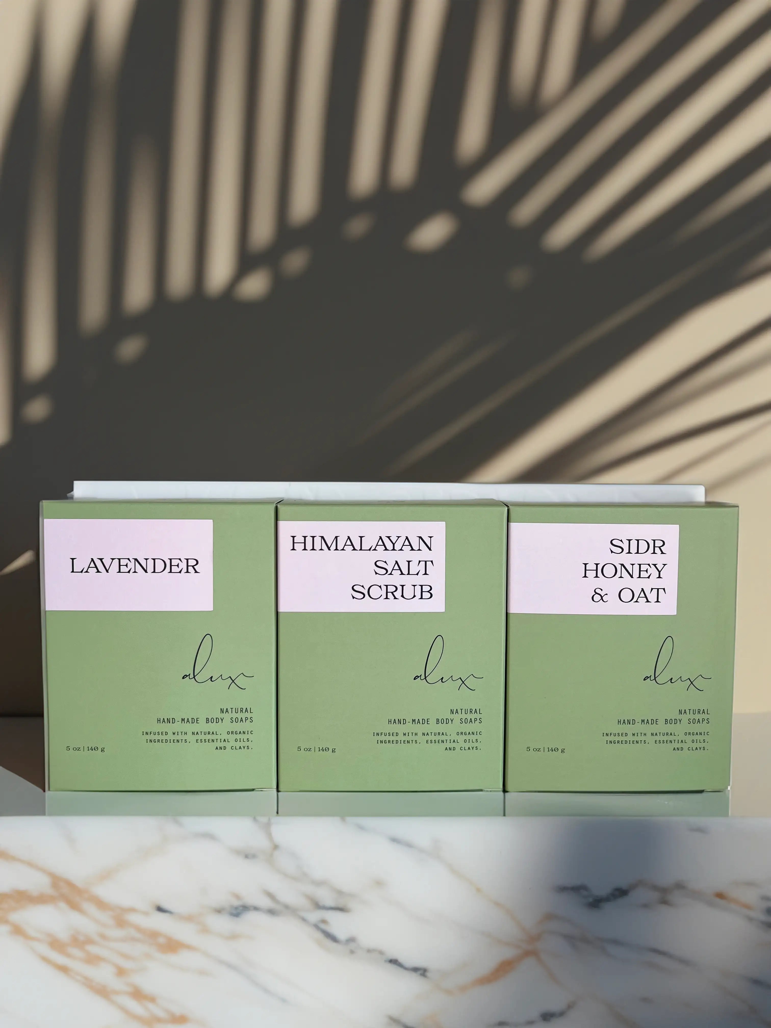 Luxury Soap Gift Set arranged beautifully, showcasing Sidr Honey & Oat, Lavender, and Pink Himalayan Salt Scrub